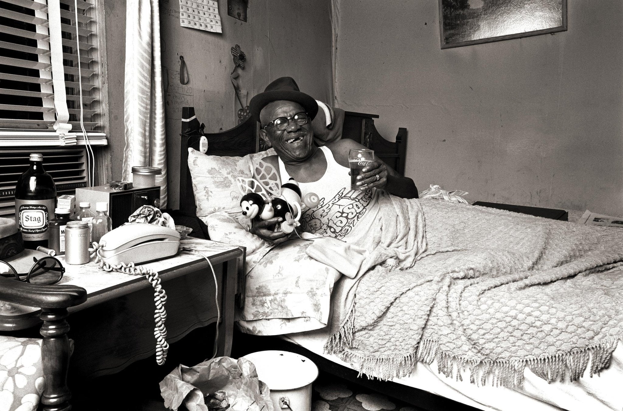 Furry Lewis - Norman Seeff, Memphis 1974 “In Bed with Wind - up Toy & Hat” - Studio CT
