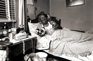 Furry Lewis - Norman Seeff, Memphis 1974 “In Bed with Wind-up Toy & Hat”